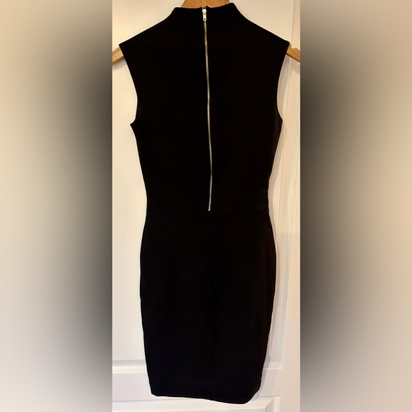Black cocktail dress with gold zipper down the back. - Picture 4 of 5